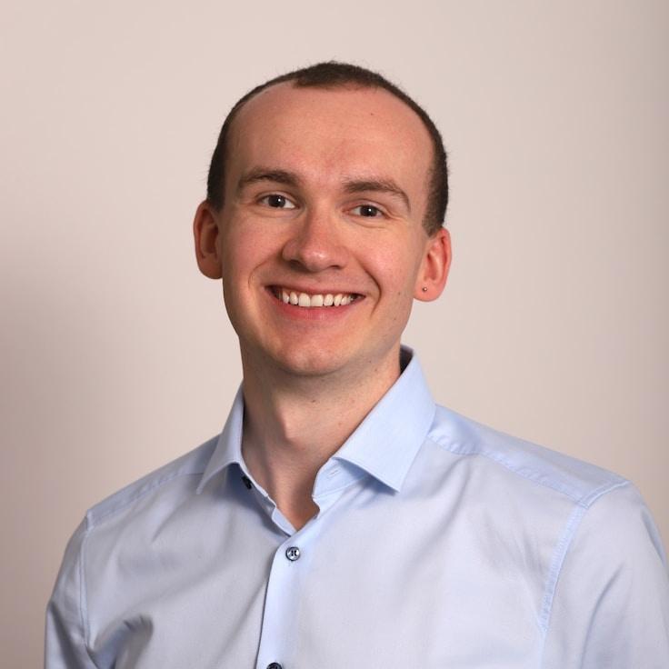 Aanya Rao, Lead Design Curator at Ventralo Matrix, reviewing corporate floral arrangements